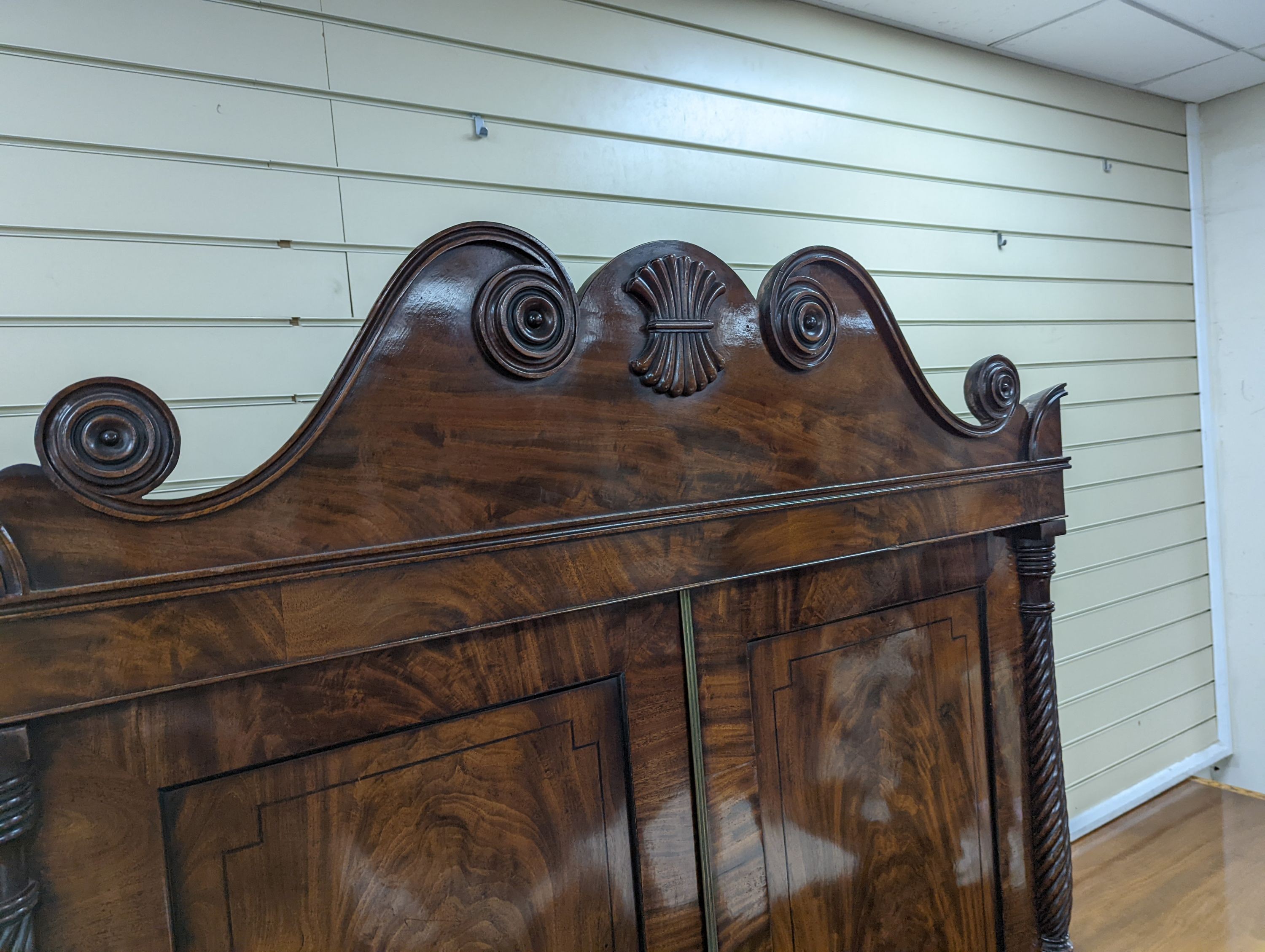 A William IV mahogany hanging cupboard, converted from a linen press, width 120cm, depth 57cm, height 204cm